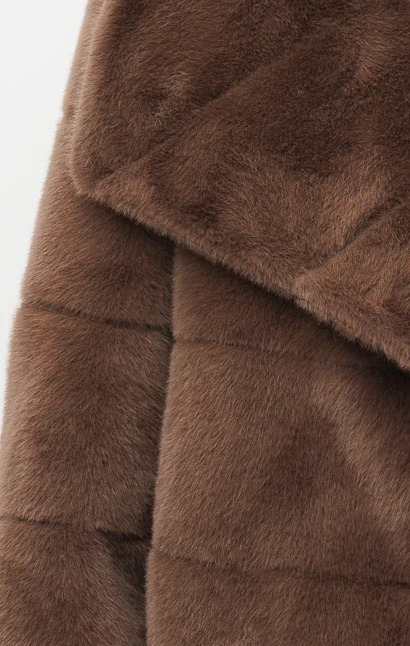 Close crop of the fur, showing the pile and the quilted seams